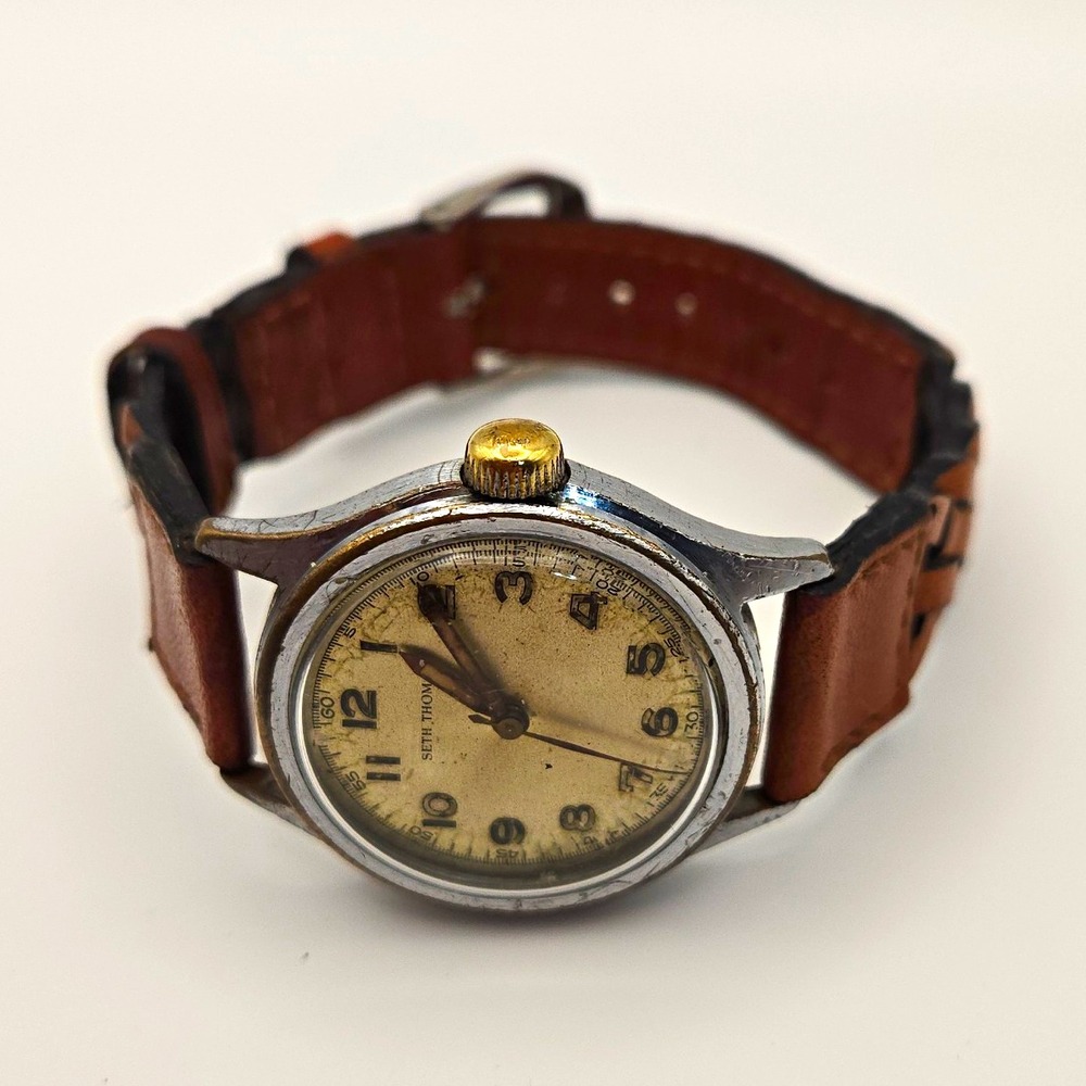 Vintage Seth Thomas 32mm Manual Wind Watch Beige Dial Brown Leather Band.